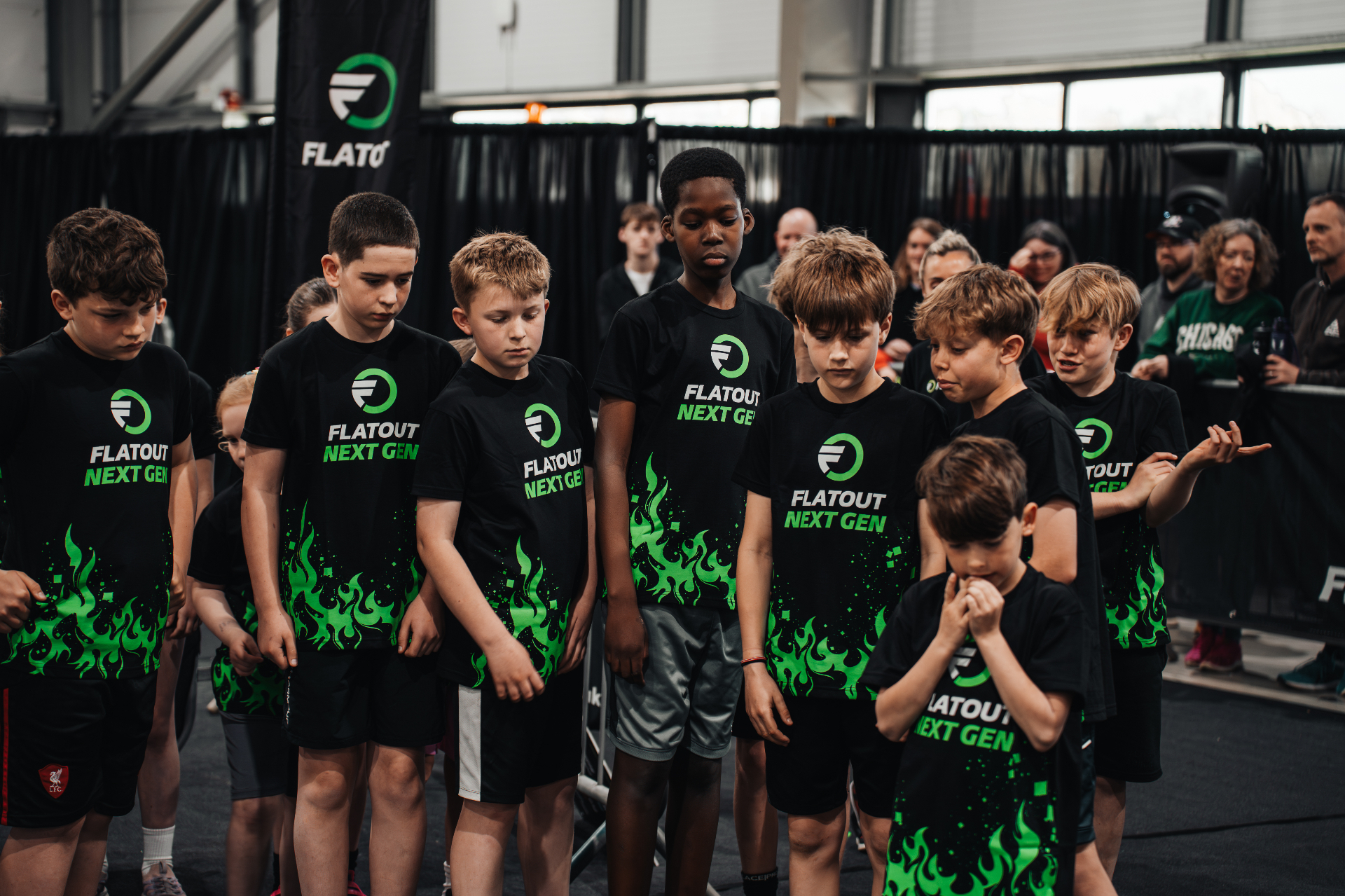 Young athletes lined up at a Flatout NextGen race